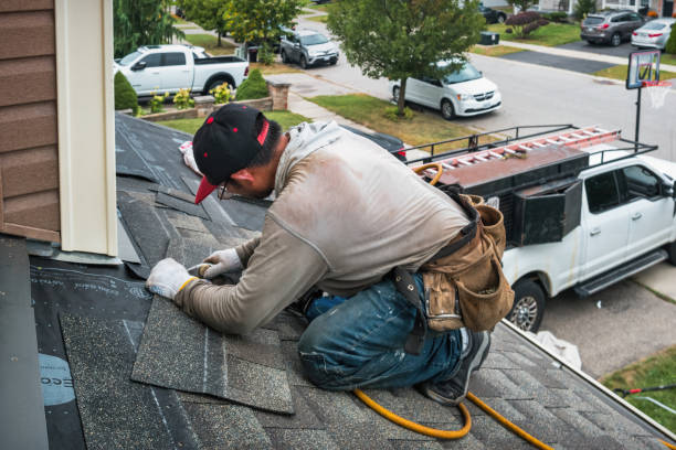 Professional Roof Replacement technician working in Pleasantville, PA